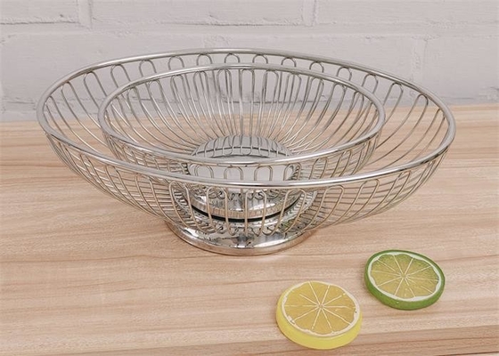 Un buen precio. 304 de acero inoxidable Cesta de frutas Cesta de pan Cesta redonda de alambre oval Cesta de productos en línea